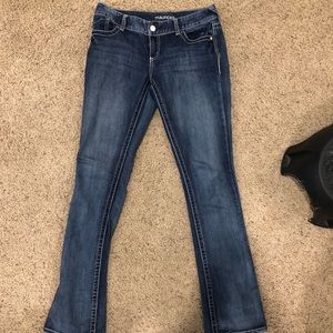 Distressed denim bootcut jeans